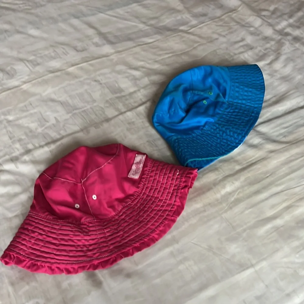 UV Skinz kids fuchsia and blue bucket hats in size 6 and 7